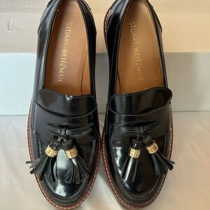 Stuart Weitzman Black Patent Tassel Loafers with Gold Accents